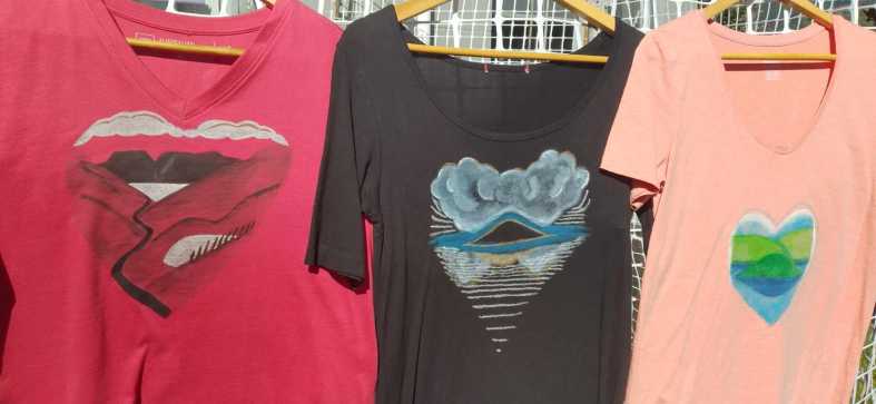 3 shirts
                painted with Rotorua landscapes